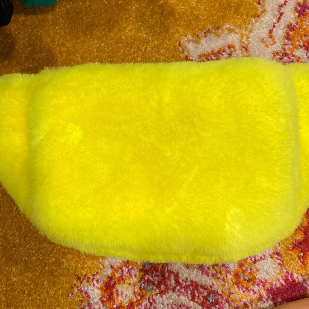Faux fur neon yellow fannypack and hand warmer